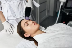 a woman gets morpheus8 treatment in a beauty clinic