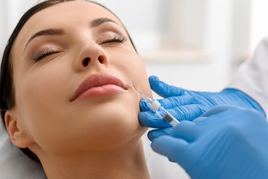 a woman receives Botox injections